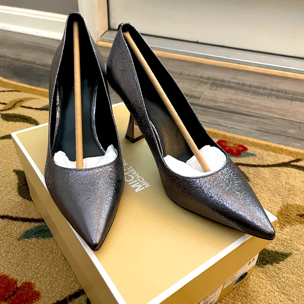 Metallic gray Michael Kors, size 8.5, 3.5in heel. Worn once for a wedding.